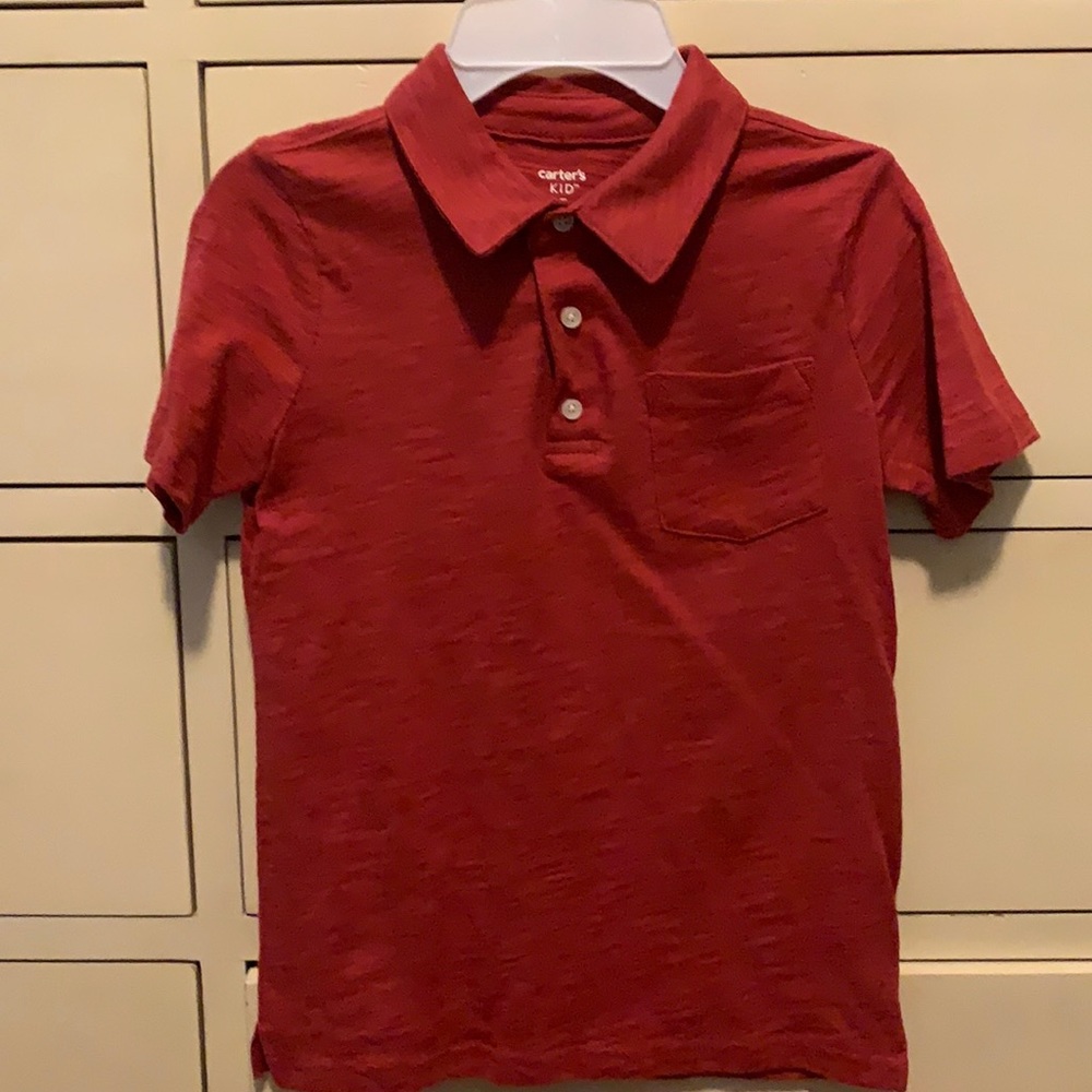 Carter’s size 7 polo shirt salmon color.